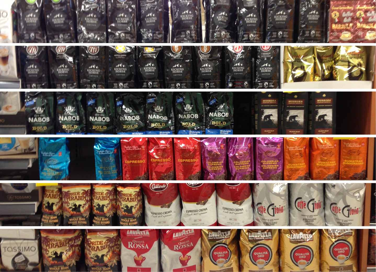 A supermarket shelf with coffee packaging
