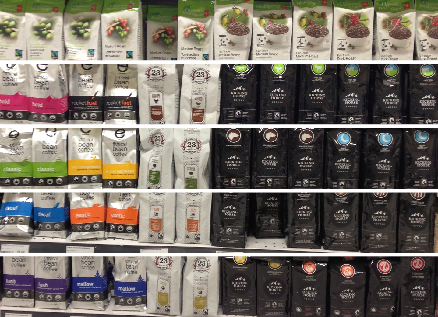 Supermarket shelves with coffee packages, showing more light-coloured bags.